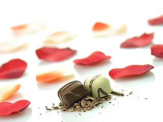 Image showing chocolate candies and rose petals