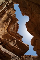 Image showing Narrow slot between two rocks in desert canyon