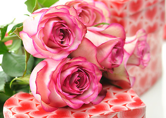 Image showing pink roses and gift boxes