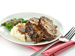 Image showing meat loaf with mashed potatoes and green beans 