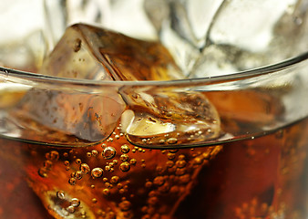 Image showing cola with ice cubes close up 