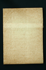 Image showing Old worn paper folded