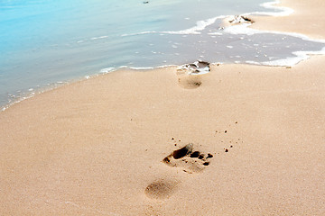 Image showing footprints on sand beach