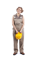 Image showing Senior woman with a safety hat