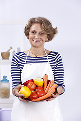 Image showing Senior woman cooking