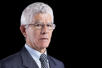 Image showing Senior businessman looking