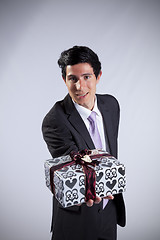 Image showing Businessman with a gift package