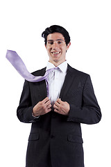 Image showing Businessman with a flying necktie