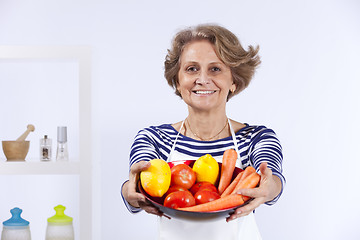 Image showing Senior woman cooking