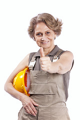 Image showing Senior woman with a hardhat