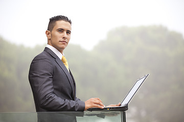 Image showing Modern businessman at the office balcony