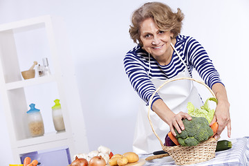 Image showing Senior woman cooking