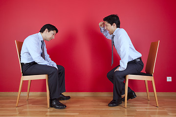 Image showing Twin businessman fighting