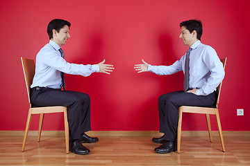 Image showing Handshake agreement between two businessman