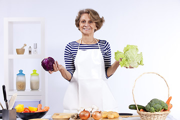 Image showing Senior woman cooking