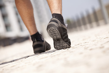 Image showing Athlete man shoes walking