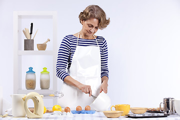 Image showing Senior woman cooking