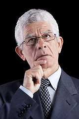 Image showing Senior businessman looking up