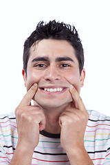 Image showing Young man with a funny face