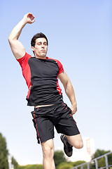 Image showing Athlete jumping at the park