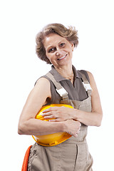 Image showing Senior woman with a hardhat
