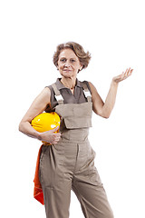 Image showing Senior woman with a safety hat