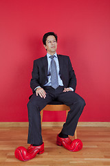 Image showing Businessman with clown shoes