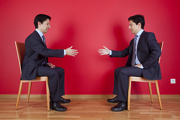 Image showing Handshake agreement between two businessman