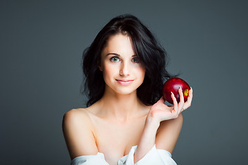 Image showing Sexy young woman with fresh red apple