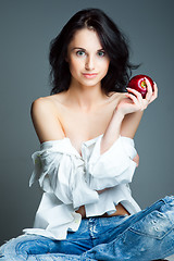 Image showing Sexy young woman with fresh red apple