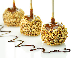 Image showing Candy apples with caramel sauce