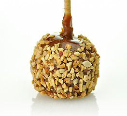 Image showing Candy apple with caramel sauce