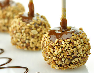 Image showing Candy apples with caramel sauce