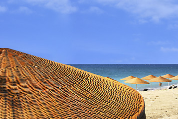 Image showing Beach view behind umbrella