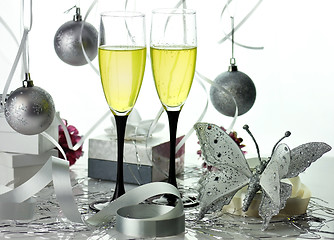 Image showing Glasses of champagne with christmas decorations 