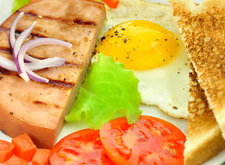Image showing Sliced grilled ham with egg and vegetables 