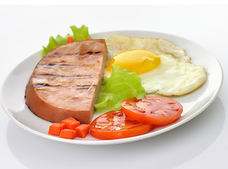 Image showing Sliced grilled ham with egg and vegetables