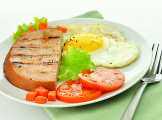 Image showing Sliced grilled ham with egg and vegetables