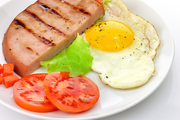 Image showing Sliced grilled ham with egg and vegetables