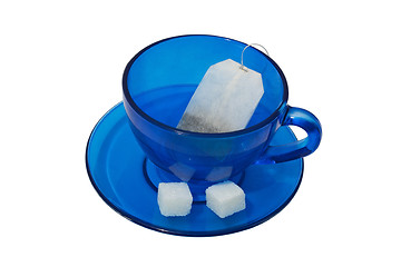Image showing A tea bag in a blue cup.