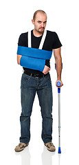 Image showing man with crutch