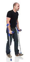 Image showing man with crutch