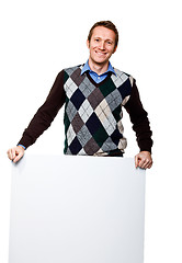 Image showing man with board