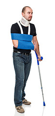 Image showing man with crutch