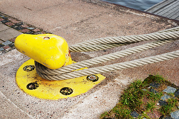 Image showing yellow bollard in the port 