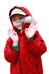 Image showing Boy with toy lambkin