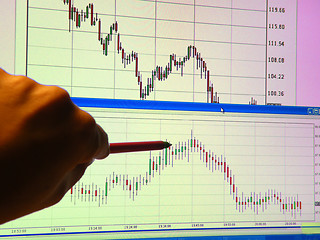 Image showing hand points to monitor