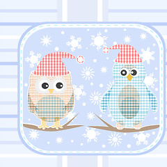 Image showing illustration of an owl and a penguin on a tree under snowfall