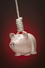 Image showing Piggy Bank Hanging in Hangman's Noose on