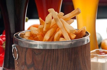 Image showing fresh french fries on a bucket